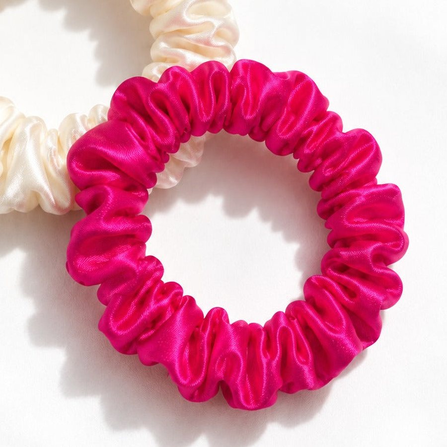 A Hot Pink Candy Dot seen from above, with numbered pins on the silk, the gathers and the elastic