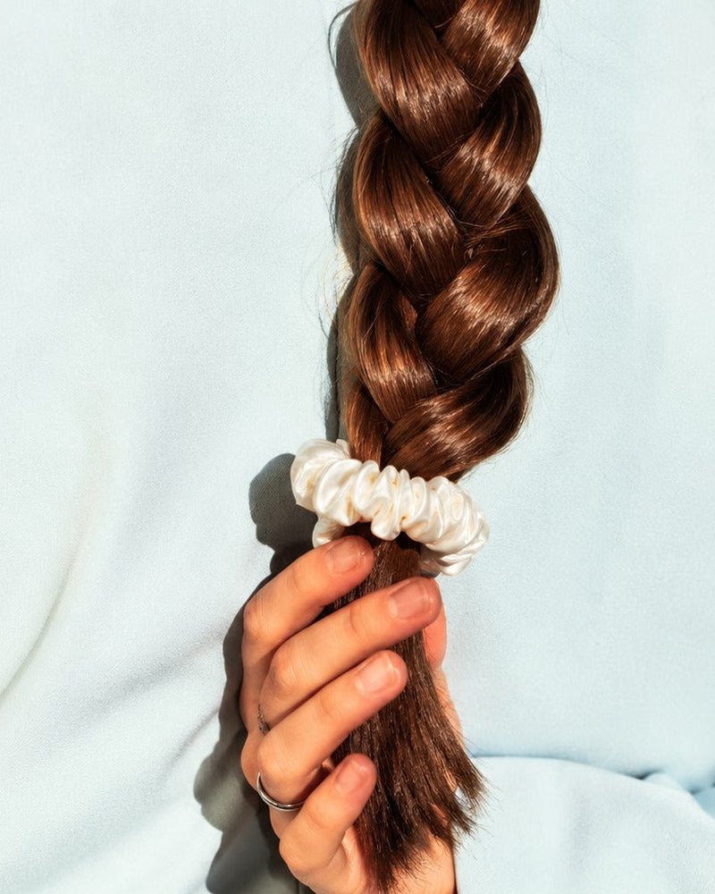 Smooth hair held by a Candy Dot silk scrunchie