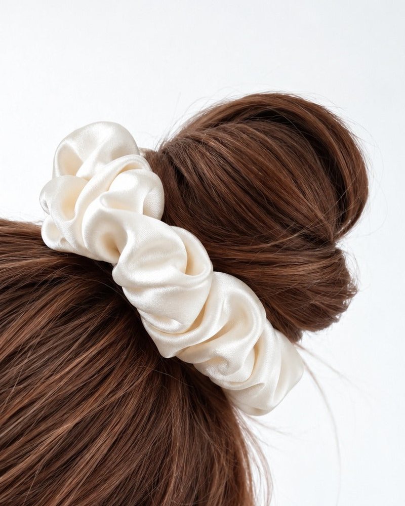 A Candy Pop silk scrunchie holding hair in place